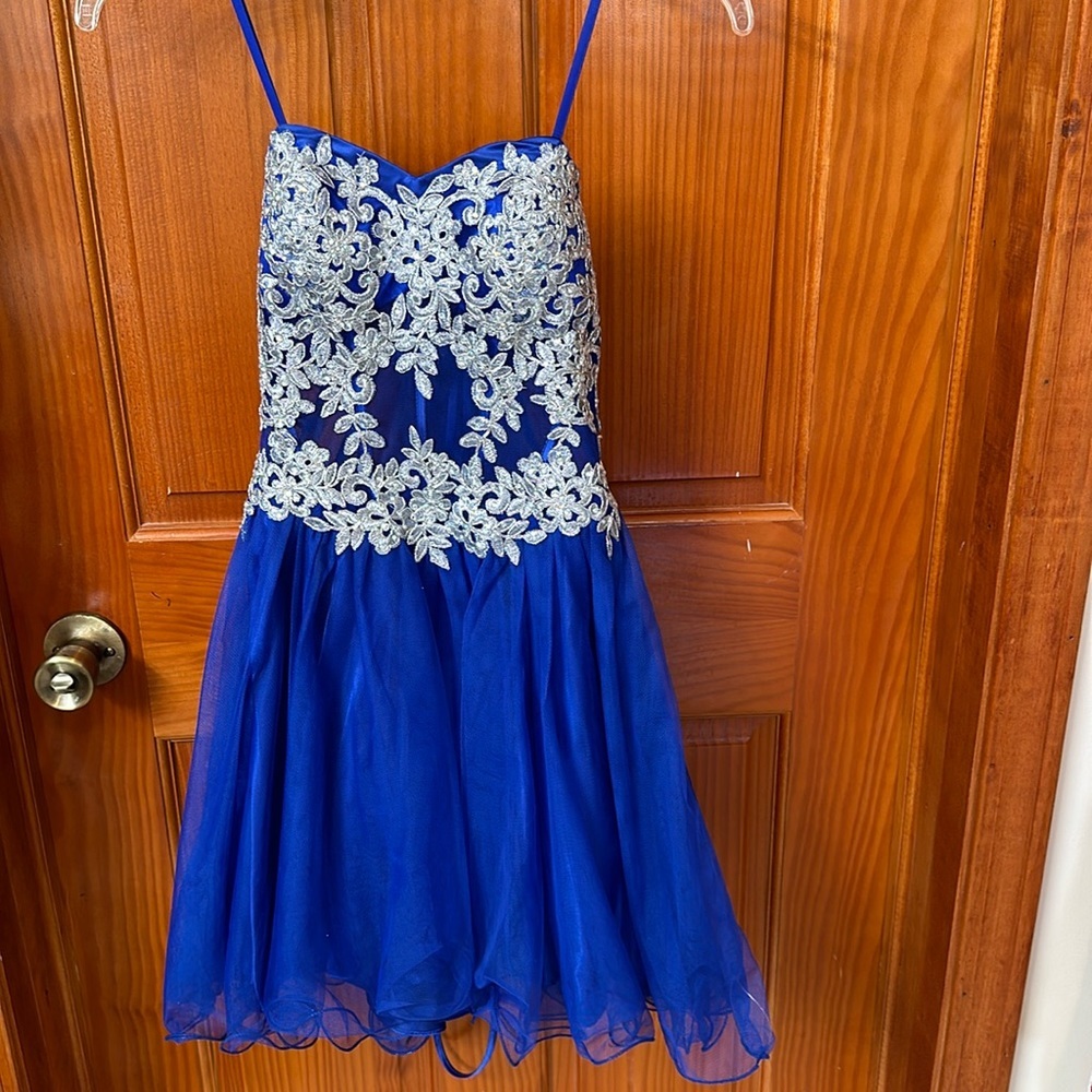 Blondie nites  royal blue dress 💙 👑 with silver designs on the top! Size 1